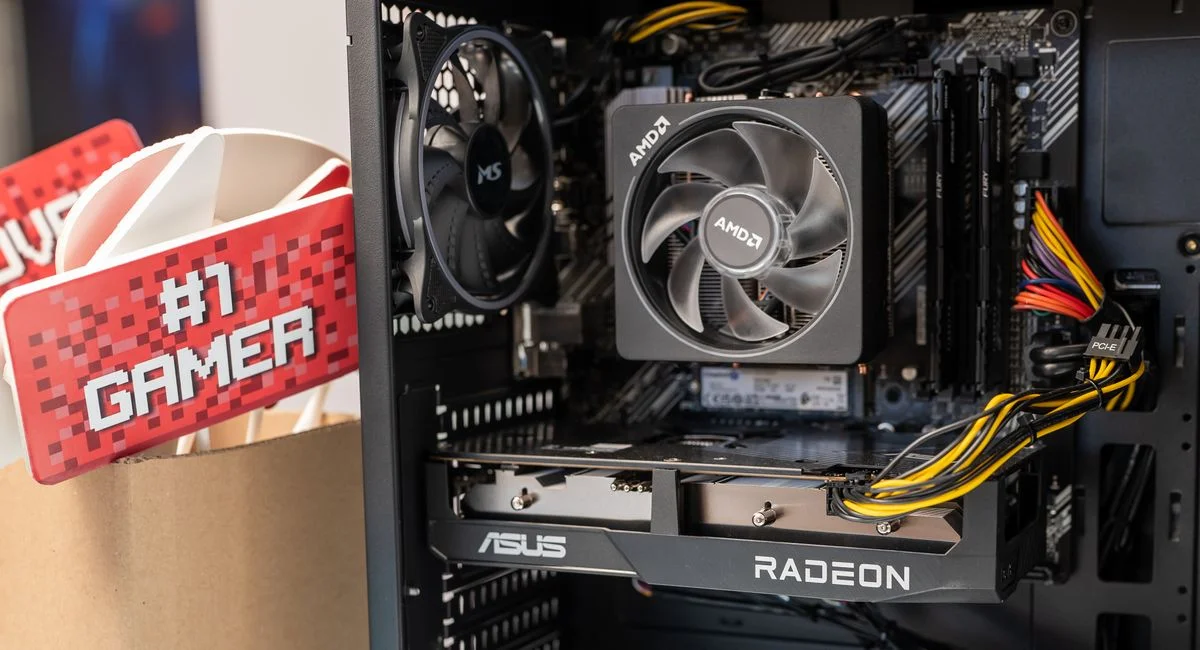 Close-up of gaming computer interior with cooling fan and graphics card.