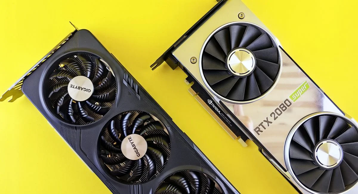 Two modern graphics cards on a bright yellow background, highlighting technology and design.