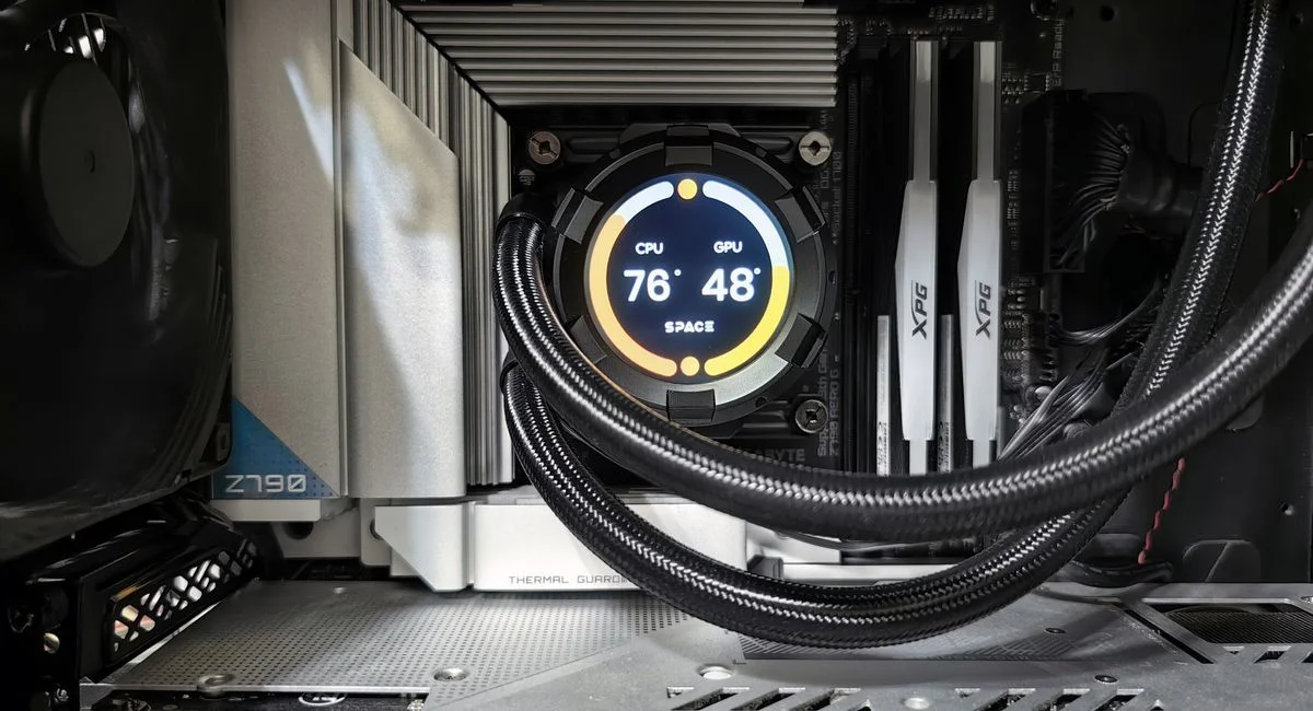 Close-up view of advanced PC hardware with visible GPU and cooling system in detail.